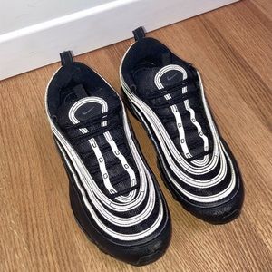 TheNike air max 97 sneakers. 
Women’s us size 7. 
Black.